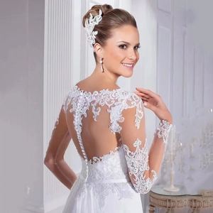 Elegant white lace mermaid wedding dress with long sleeves and detailed button back design