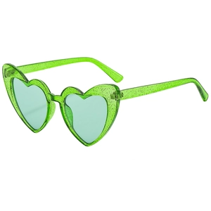 Detailed side view of heart-shaped glitter green sunglasses with transparent resin frame