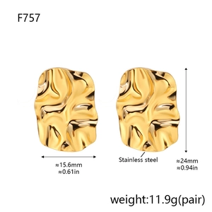 Macro shot of 18K gold plated stainless steel earrings with textured surface and size details