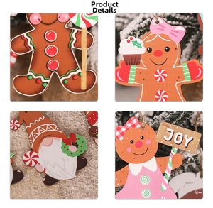 Detailed view of colorful printed wooden Christmas ornaments with gingerbread and gnome designs