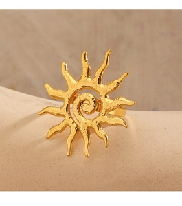 Macro detail of 18K gold plated sun ring with hammered texture on adjustable band