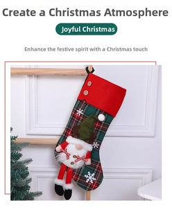 Detail of red and green plaid Christmas stocking with 3D gnome doll and wood buttons