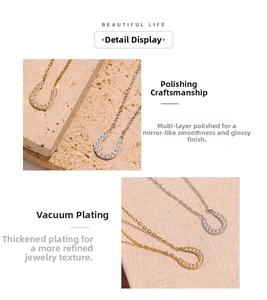 Detail view of multi-layer polishing and vacuum plating on zircon horseshoe necklace
