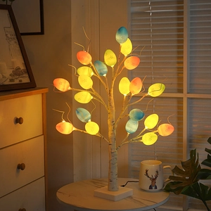 Easter birch tree light with glowing colorful eggs featuring hollow floral patterns