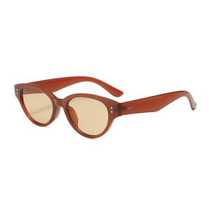Retro cat-eye sunglasses with tortoise frame, yellow lenses and dual metal rivet accents