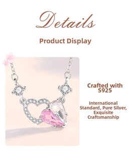 Detail of S925 sterling silver necklace featuring intertwined hearts with pink zircon