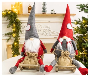 Christmas gnomes with wooden sleds and burlap bags in a cozy festive interior setting