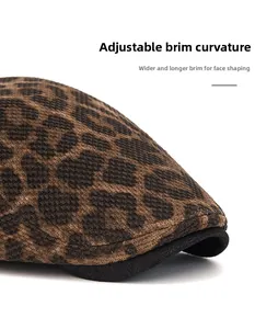 Macro detail of leopard print beret featuring a bendable brim and warm knitted fabric
