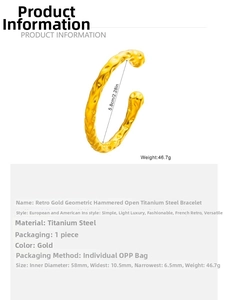 Detail view of the 18K gold-plated stainless steel C-shape cuff with irregular hammer textures