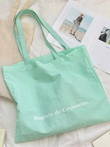 Mint green large canvas tote bag with Magasin de Croissants print for women