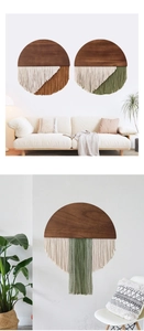 Detailed macro view of bohemian wall hanging featuring wood panel and cotton rope tassels