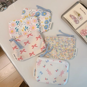 Detailed set of five floral cotton mini pouches with zipper and simple wish labels