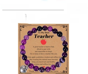 Detail view of 8mm purple agate beads bracelet and teacher gift message card