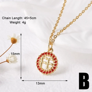 Macro shot of gold FE letter pendant necklace showing 45+5cm length and 15mm size details