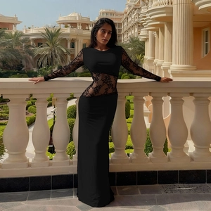 Robe longue sexy en dentelle noire à manches longues et coupe ajustée ajourée