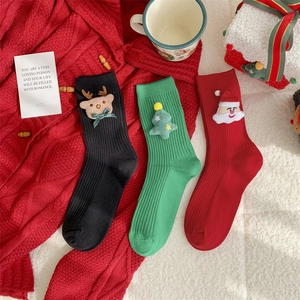 Three pairs of festive Christmas socks with 3D Santa, Reindeer and Tree plush charms