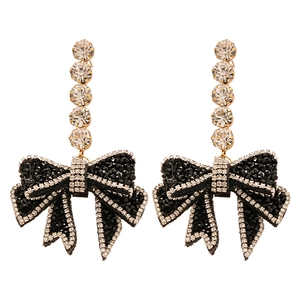 Dark style bow earrings with black crystals and diamonds on a gold base for women