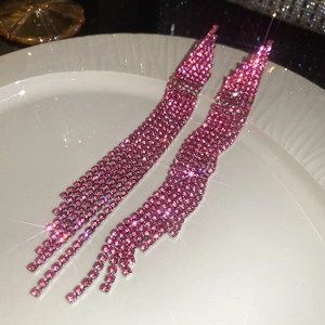 Close-up of elegant pink rhinestone tassel earrings with multi-layered fringe