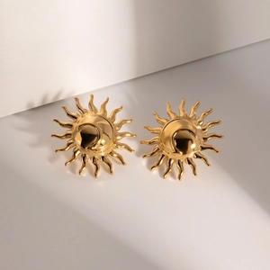 Boucles d'oreilles soleil en acier inoxydable doré 18k sur bloc géométrique