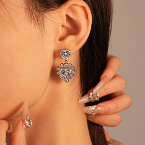 Elegant heart-shaped zircon drop earrings with pavé diamond halo in silver-tone finish