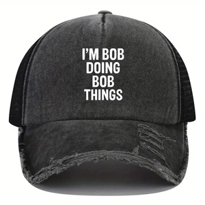 Distressed washed black baseball cap featuring I'M BOB DOING BOB THINGS white slogan