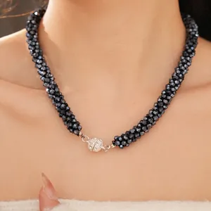 Elegant beaded necklace with black crystals and a sparkling silver magnetic buckle