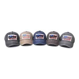 Vintage washed cotton baseball caps with American flag embroidery in five retro colors
