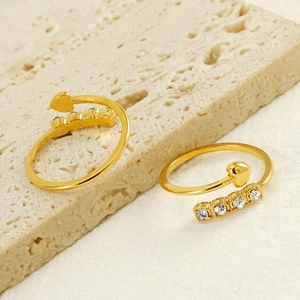 Golden open rings set with heart charm and four round cubic zirconia accents for women