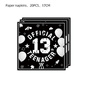 Close-up of 13th birthday paper napkins with Official Teenager print and balloon details