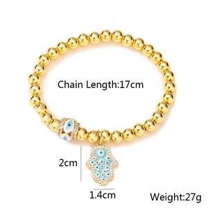 Detail of Hamsa Hand and Evil Eye charm bracelet with size and weight specs