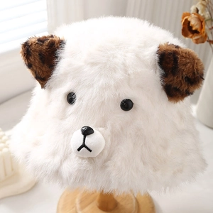 Cute white plush dog bucket hat with leopard print ears on a wooden stand