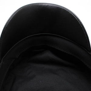 Detailed close-up of the inner lining and stitching on the black snakeskin leather hat