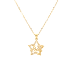 Close-up of golden star-shaped necklace pendant with Mama engraving and zircon inlay