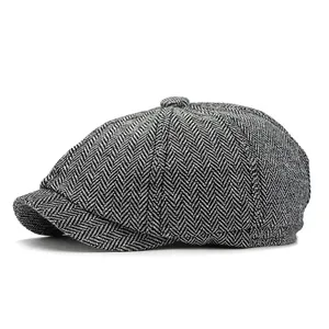 Classic grey herringbone newsboy cap with vintage British style for men and women