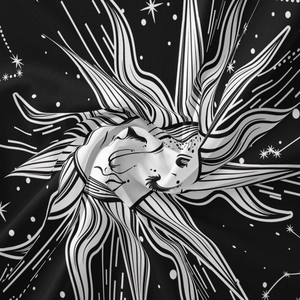 Detailed view of bohemian celestial tapestry fabric showing soft texture and sun star patterns