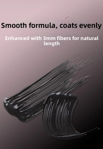 Macro shot of black mascara texture with 3mm fibers for natural long lashes