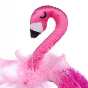 Detailed close-up of pink flamingo headband with soft feathers and velvet neck texture