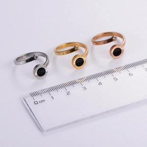 Size measurement of Roman numeral ring with black disc and small zircon accent