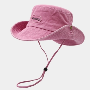 Pink washed denim heart bucket hat with adjustable chin strap and heart embroidery patch