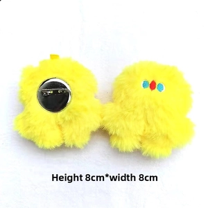 Front and back detail of cute yellow plush chick brooch with 8cm soft furry texture