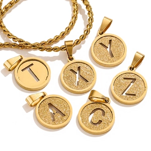 Golden twisted chain necklace with 18K gold-plated alphabet pendants featuring sandblast texture