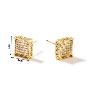 Macro shot of 1cm square gold studs with micro-pave white cubic zirconia stones