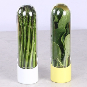 Detail view of transparent herb savor pods with white and yellow bases storing fresh greens