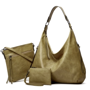 Detail view of olive green three-piece bag set with high-quality pebbled faux leather