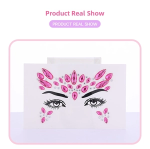 Detail view of pink and silver rhinestones face jewels for festive eye makeup decoration
