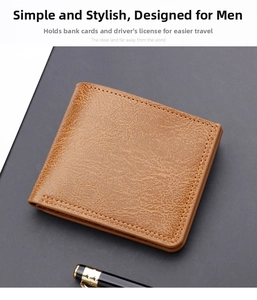 Close-up of brown pebbled leather bi-fold wallet with fine stitching and card slots