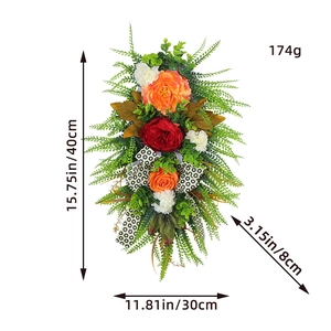 Detail view of teardrop autumn wreath with orange roses and 40cm height dimensions