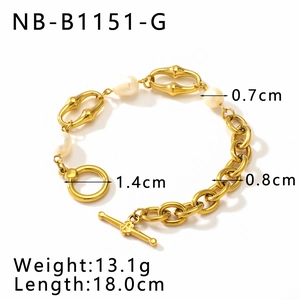 Detail view of gold chain bracelet with freshwater pearls and T-bar toggle clasp dimensions