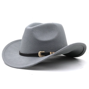 Grey felt western cowboy hat with wide brim and leather strap with golden buckle