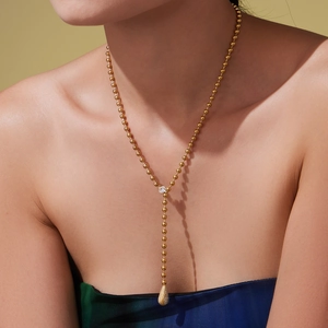 18k gold plated stainless steel bead chain Y-necklace with teardrop zircon on a model